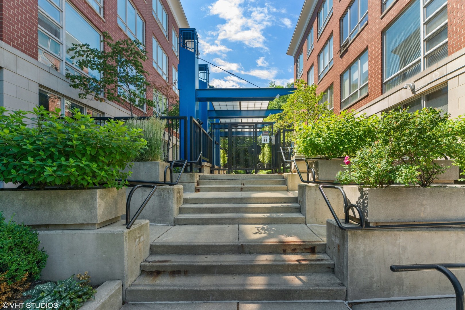 26 North May Street, Unit 322 Chicago, IL 60607 - Photo 2 of 31 a view of building with yard