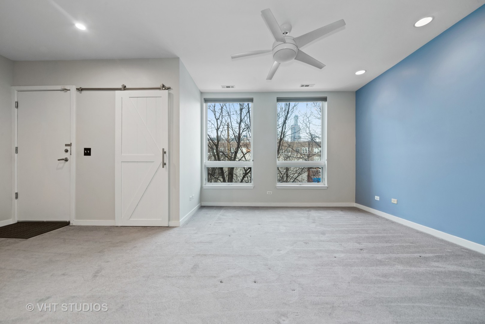 26 North May Street, Unit 322 Chicago, IL 60607 - Photo 21 of 31 a view of an empty room with a window