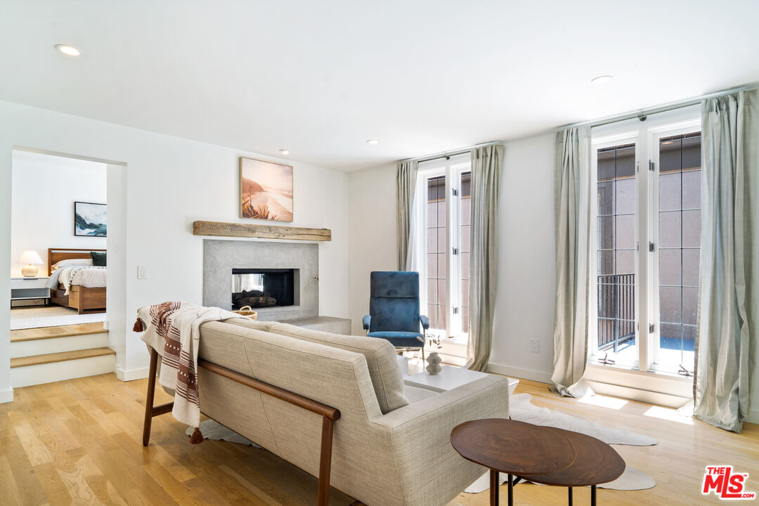 373 Mesa Road Santa Monica, CA 90402 - Photo 18 of 25 a bedroom with a bed and a couch