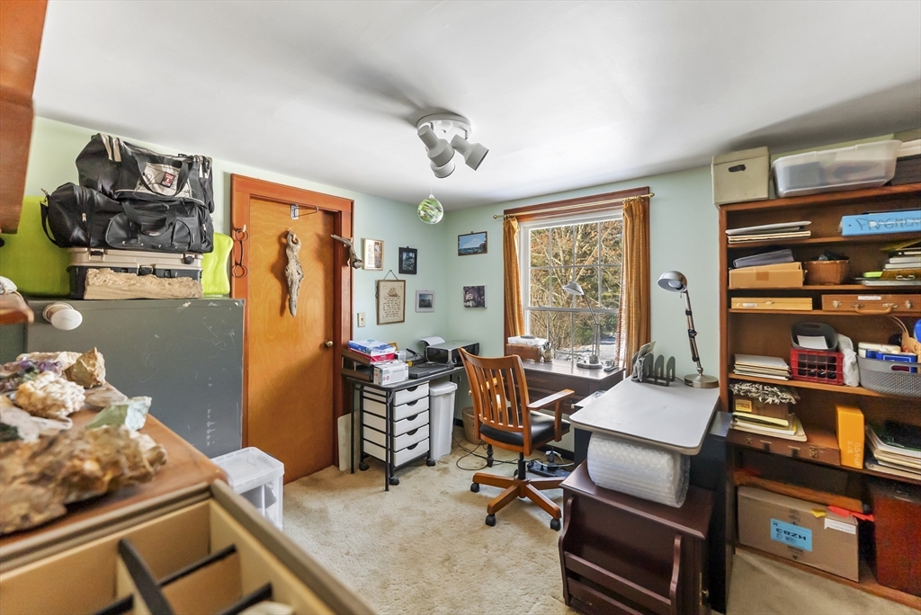 115 Kennedy Road Stoughton, MA 02072 - Photo 19 of 42 a workspace with furniture and window