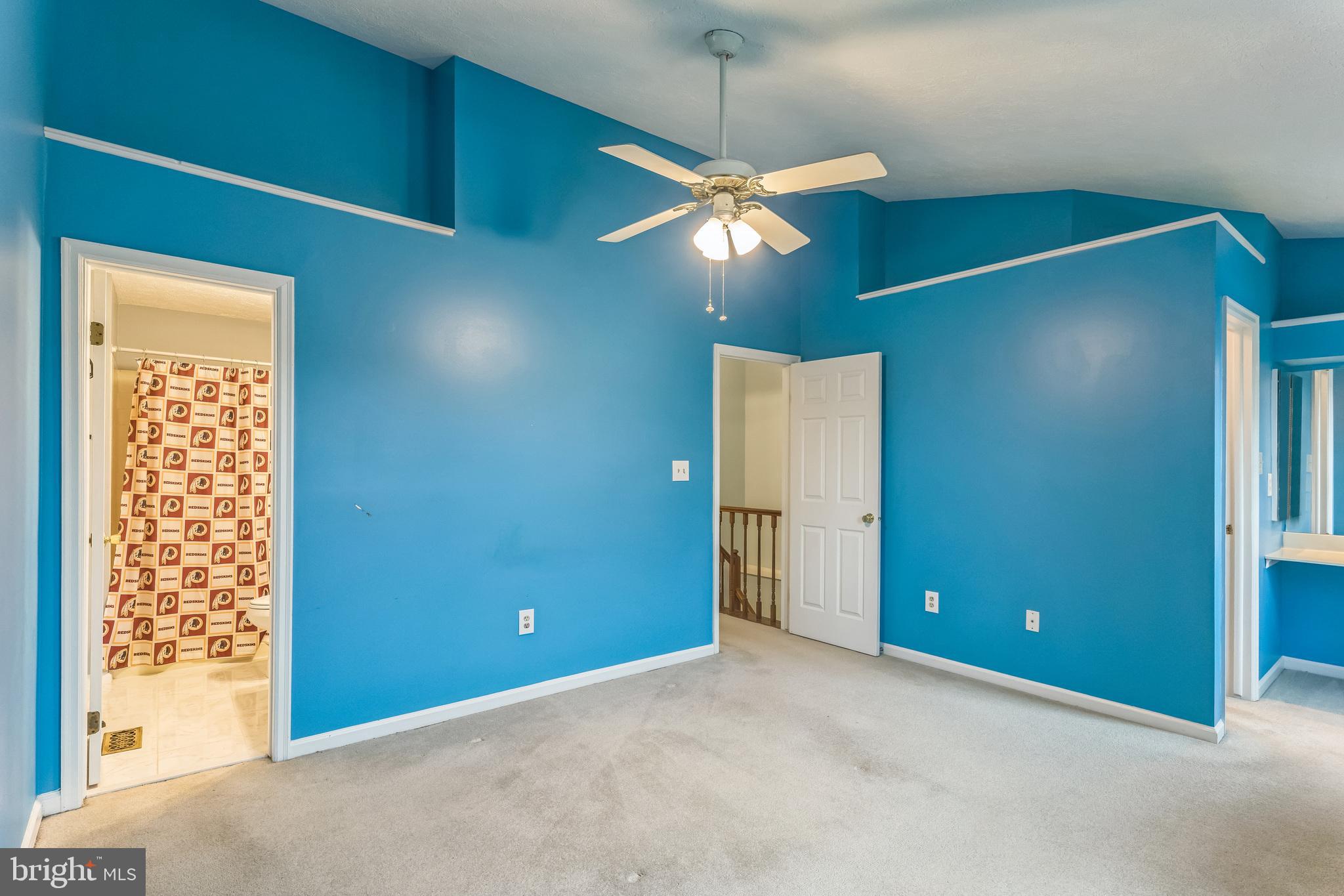 5620 Denton Court Frederick, MD 21703 - Photo 11 of 33 a view of a livingroom with a ceiling fan and window