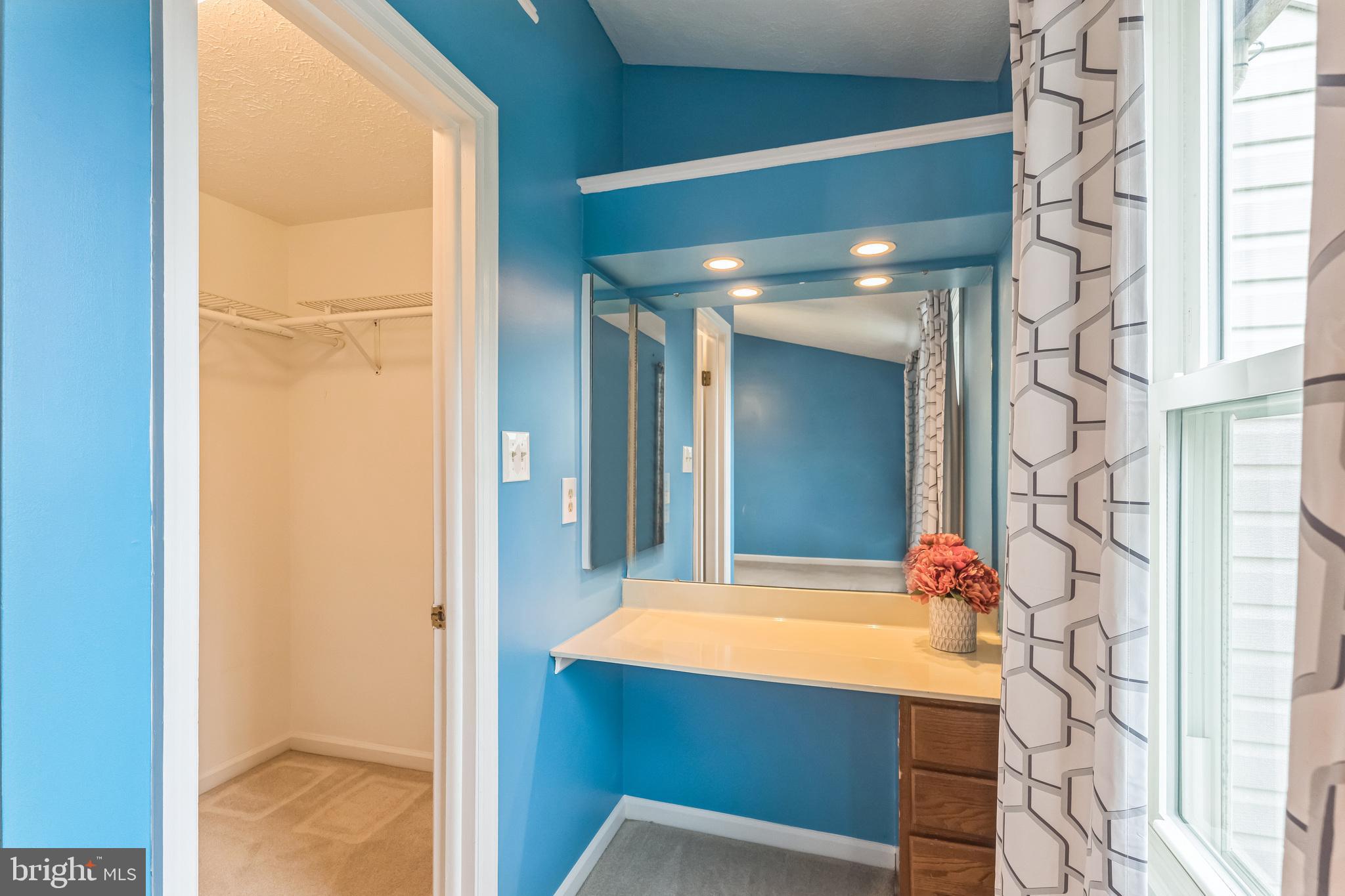 5620 Denton Court Frederick, MD 21703 - Photo 13 of 33 a bathroom with a tub and shower