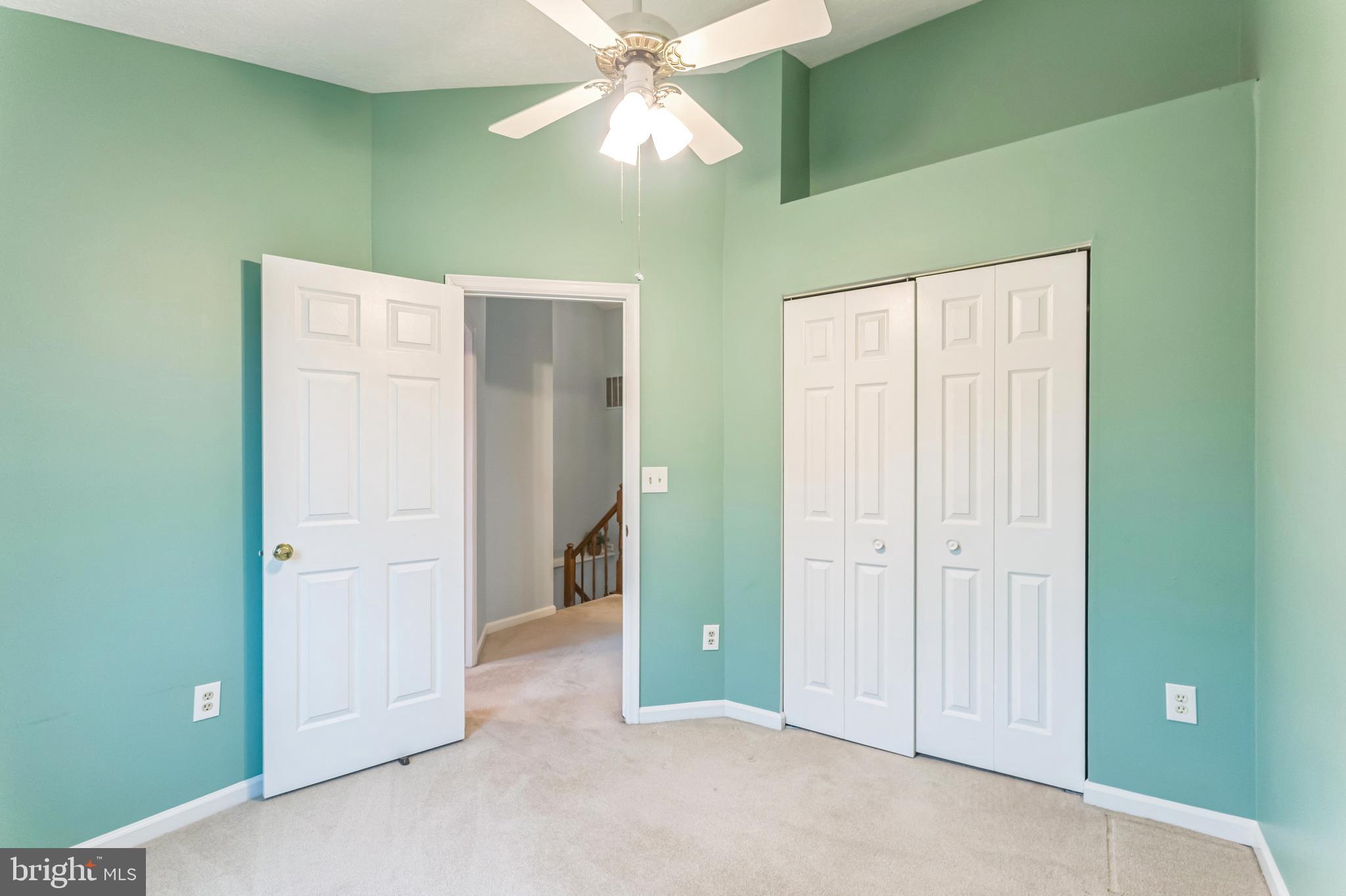 5620 Denton Court Frederick, MD 21703 - Photo 19 of 33 an empty room with closet and fan