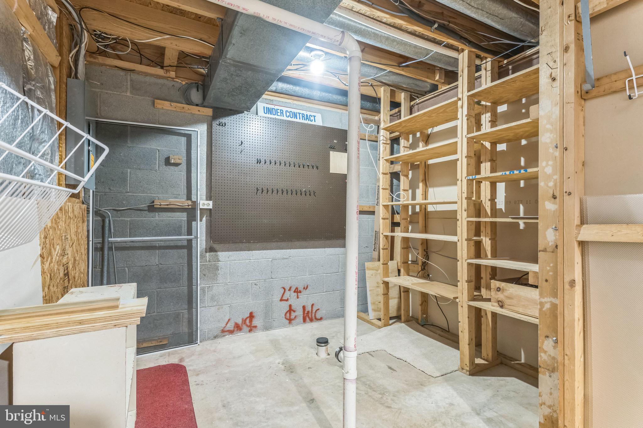 5620 Denton Court Frederick, MD 21703 - Photo 26 of 33 a view of walk in closet with clothes and shoes