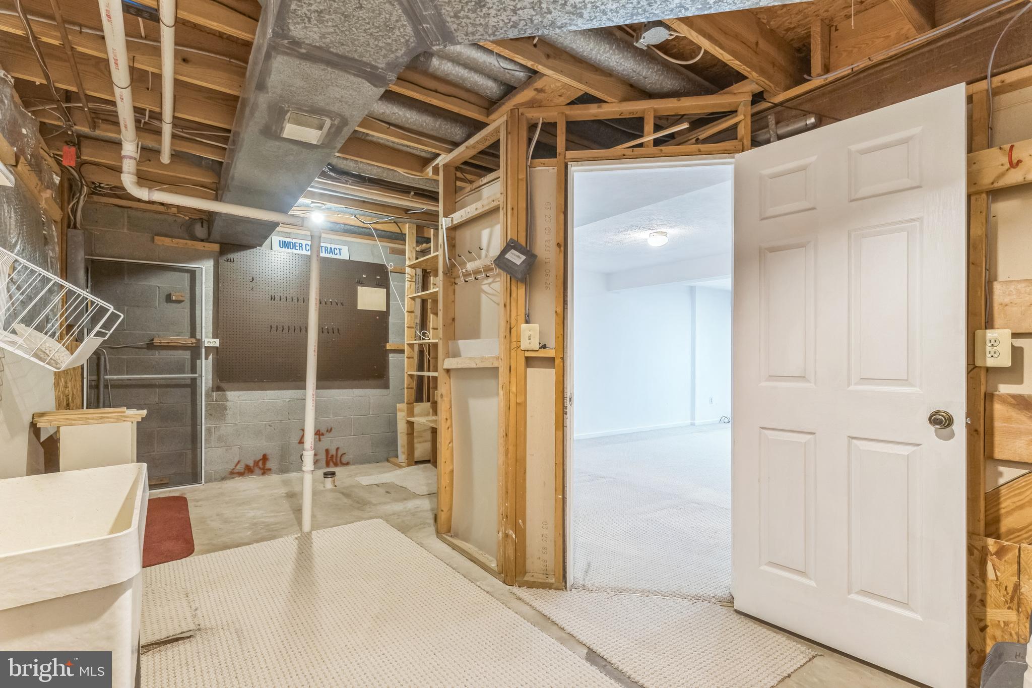 5620 Denton Court Frederick, MD 21703 - Photo 27 of 33 a bathroom with a tub and shower