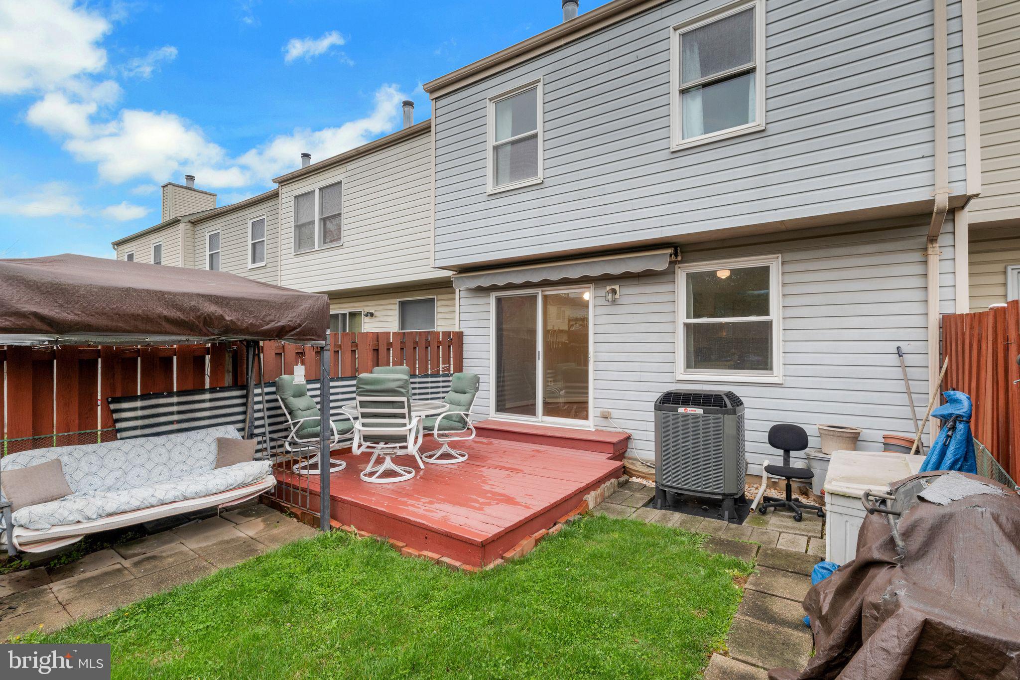 5620 Denton Court Frederick, MD 21703 - Photo 29 of 33 a backyard of a house with seating space