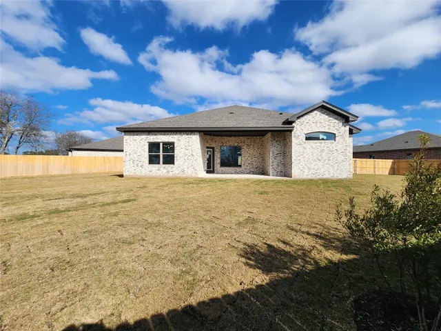 a front view of house with ocean view