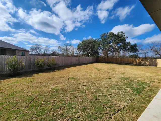 a view of swimming pool from a balcony