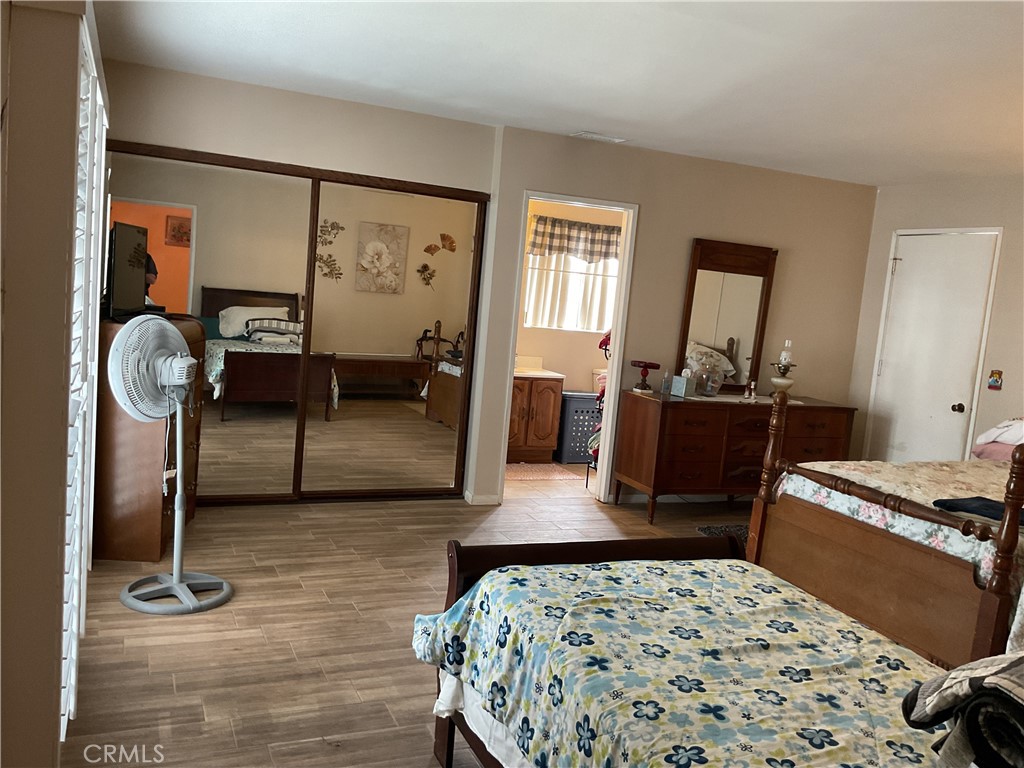 5007 Astor Avenue Commerce, CA 90040 - Photo 26 of 64 a bedroom with furniture and a window