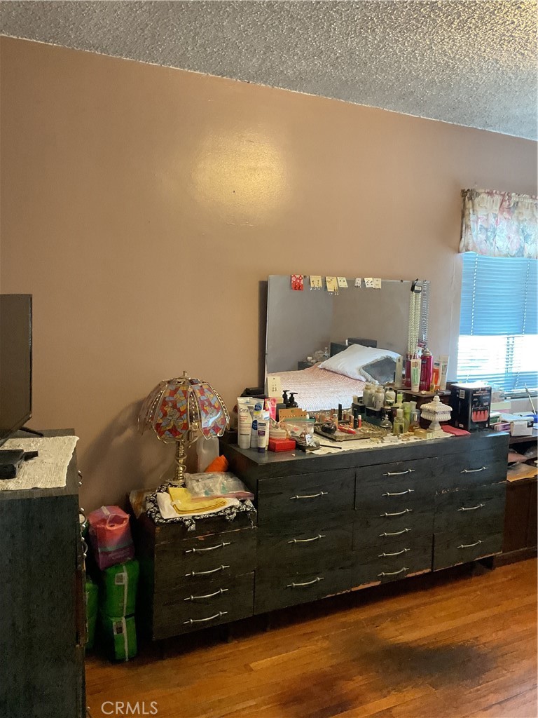 5007 Astor Avenue Commerce, CA 90040 - Photo 36 of 64 a bed room with a bed and a television