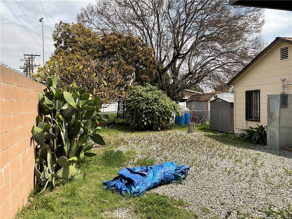 5007 Astor Avenue Commerce, CA 90040 - Photo 52 of 64 a backyard of a house with lots of green space