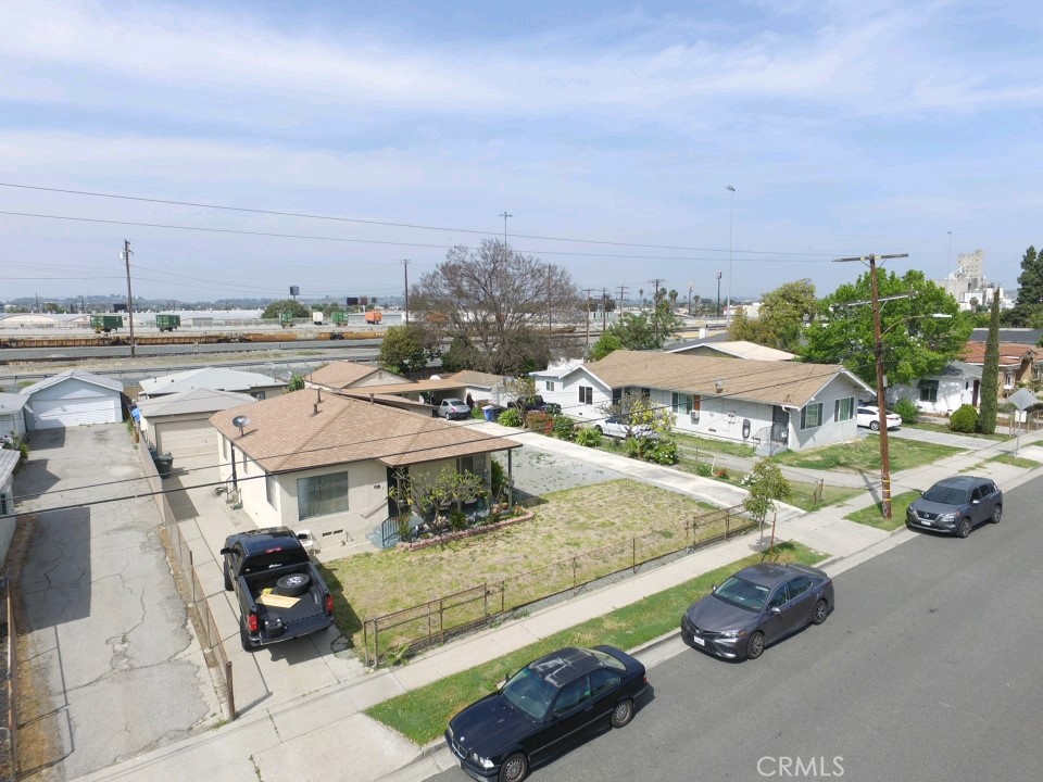 5007 Astor Avenue Commerce, CA 90040 - Photo 59 of 64 a view of a street with cars parked