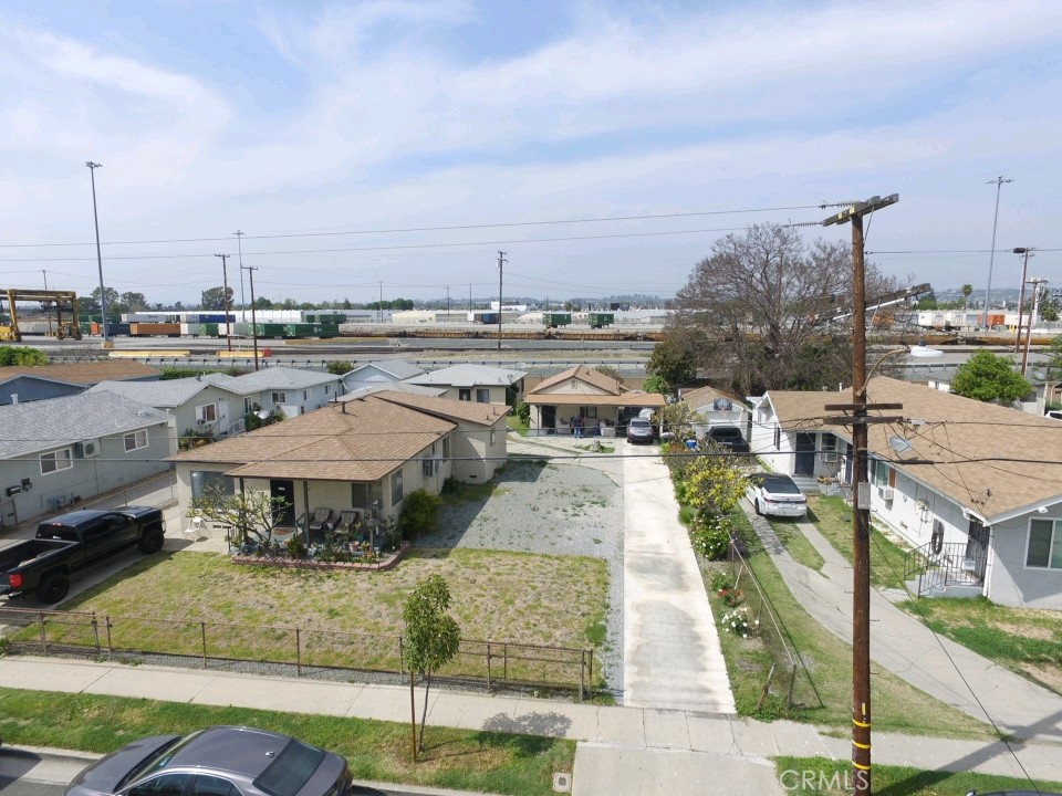 5007 Astor Avenue Commerce, CA 90040 - Photo 60 of 64 a view of a swimming pool with a lounge chairs