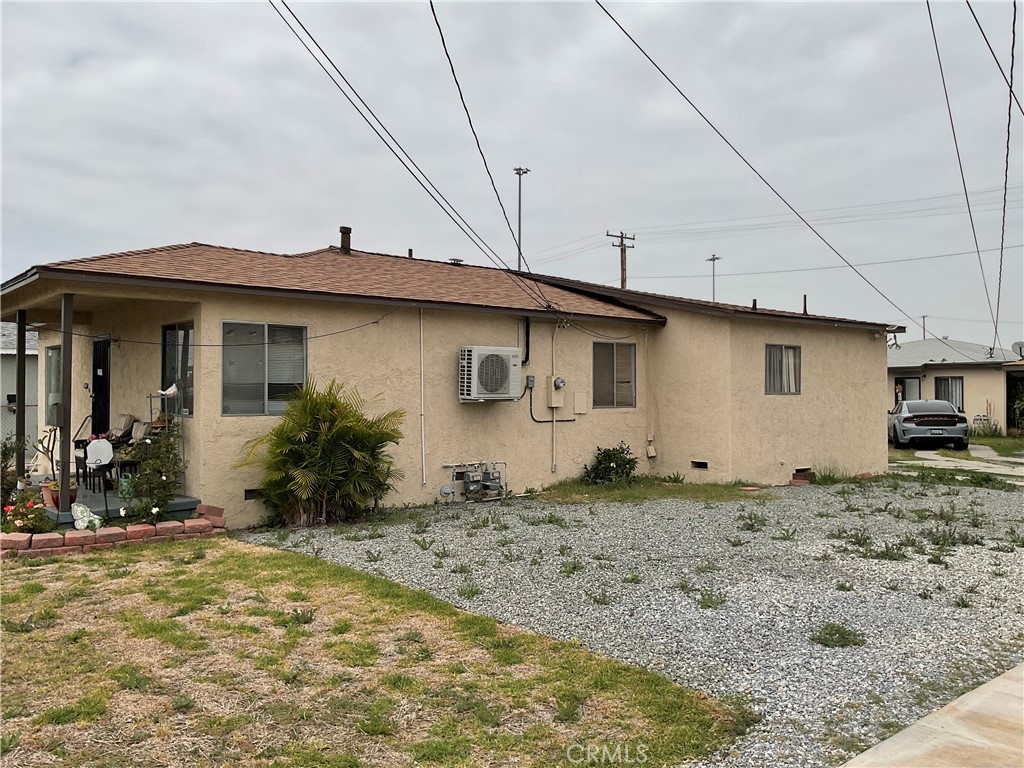 5007 Astor Avenue Commerce, CA 90040 - Photo 6 of 64 a view of a house with a backyard