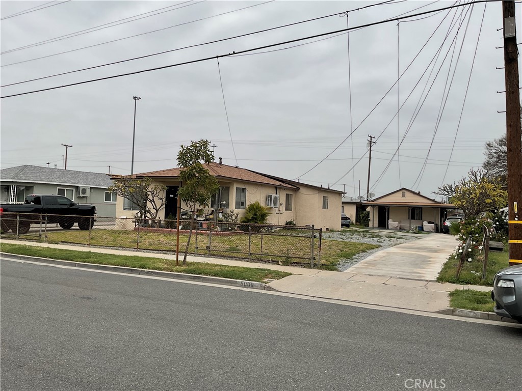 5007 Astor Avenue Commerce, CA 90040 - Photo 8 of 64 a view of a house with a street