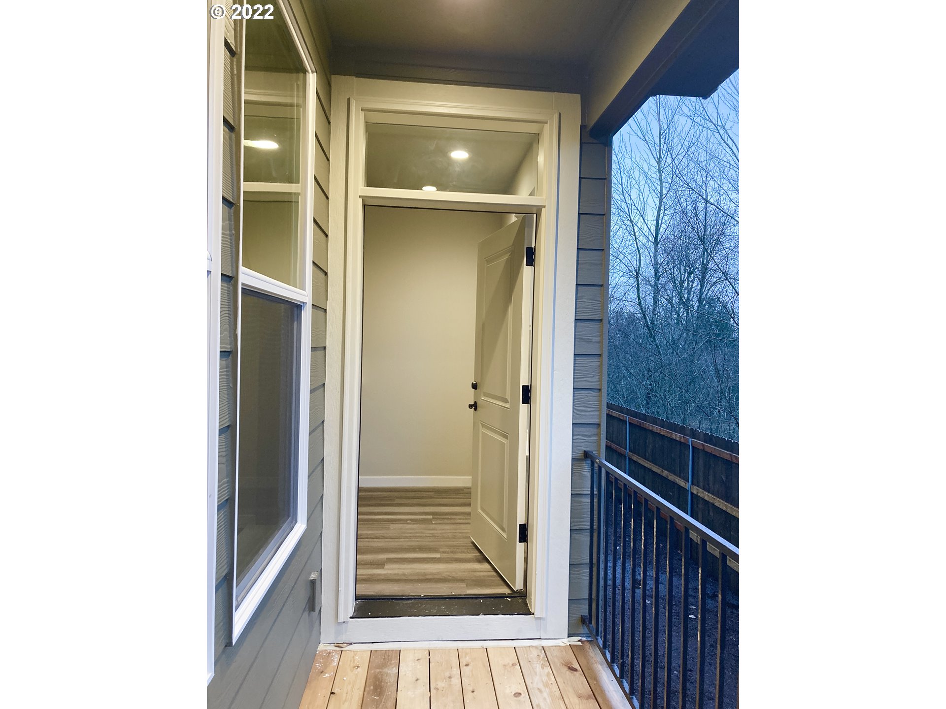 7315 South 13th Street Ridgefield, WA 98642 - Photo 6 of 11 a view of a hallway with wooden floor and entryway