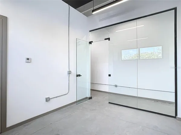 a view of a room with an empty space