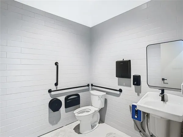 a bathroom with a sink and a toilet