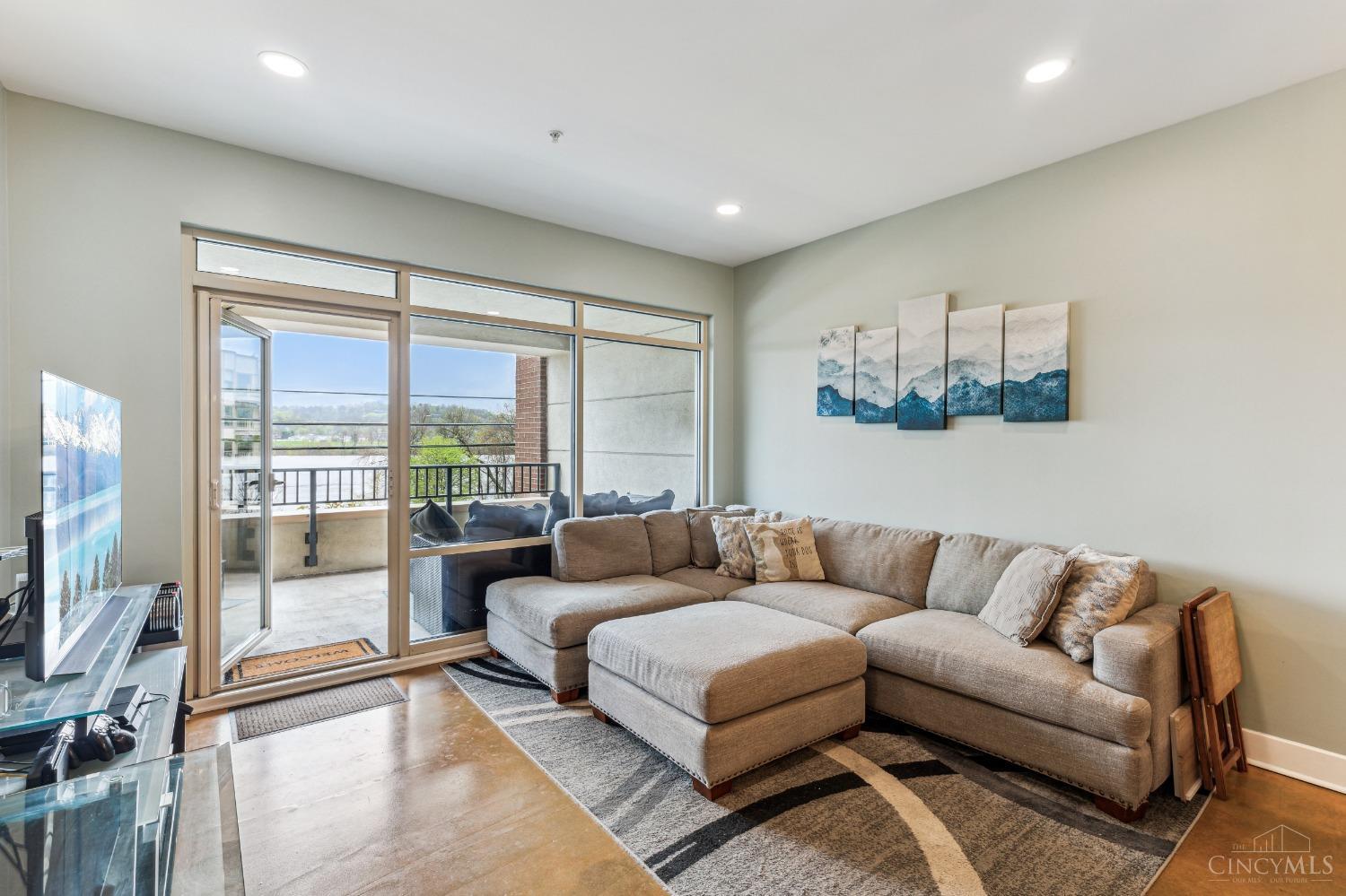 2260 Riverside Drive, Unit 205 Cincinnati, OH 45202 - Photo 19 of 37 The large living room opens out to the massive balcony and features floor to ceiling windows that capture the many vistas of the beautiful Ohio River...