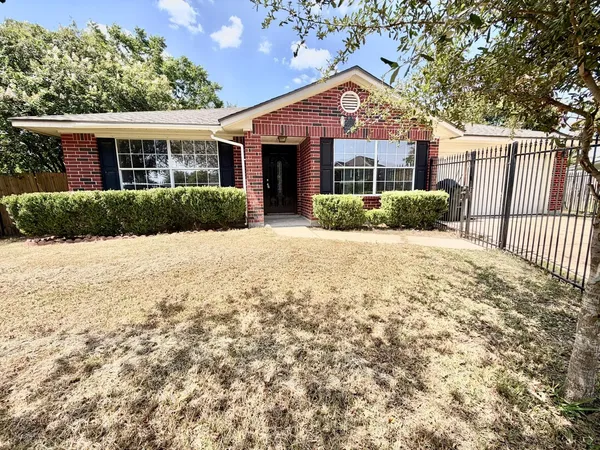 a view of house with yard