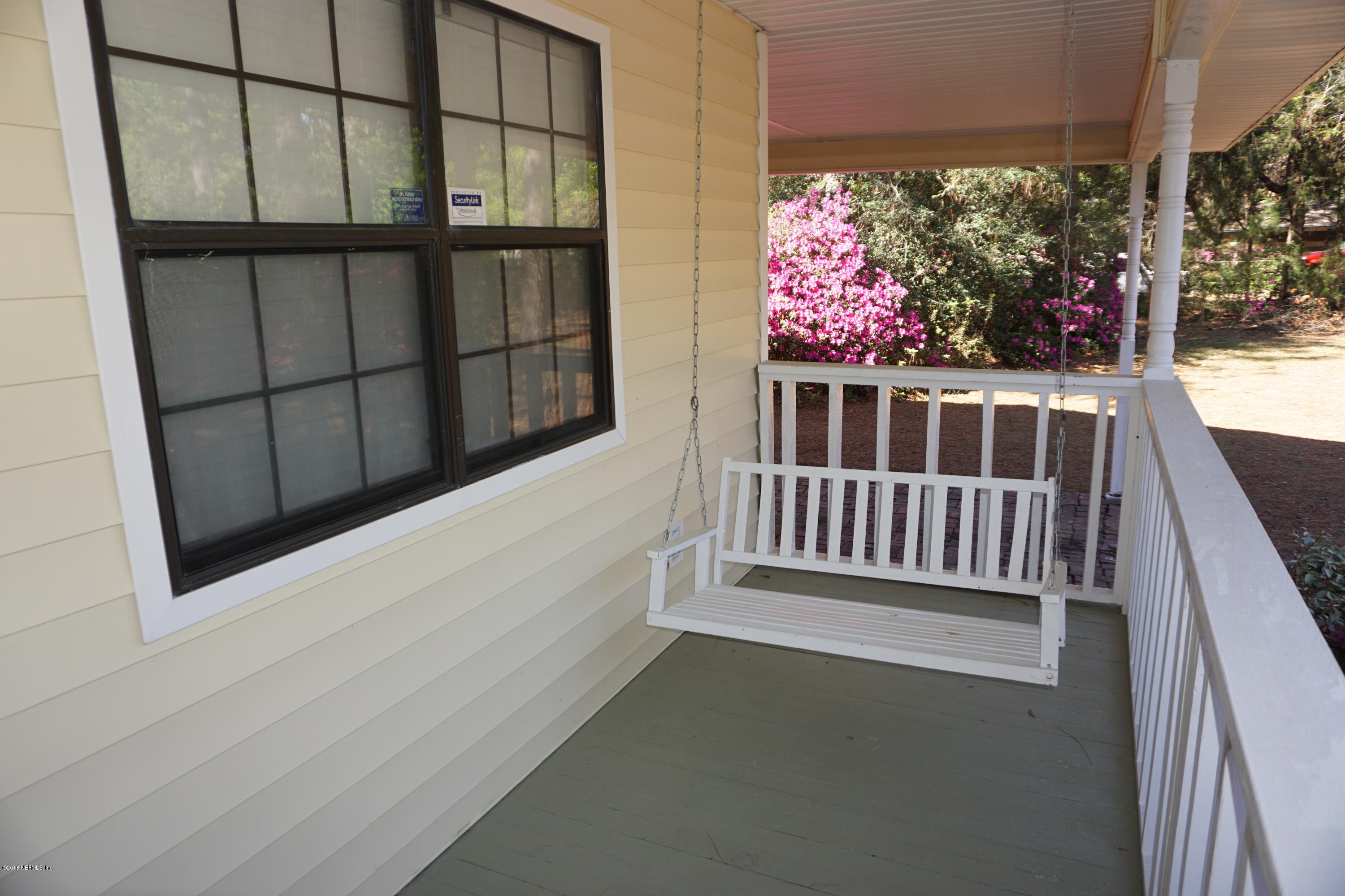 9200 Crystal Springs Road Jacksonville, FL 32221 - Photo 15 of 56 Porch swing.