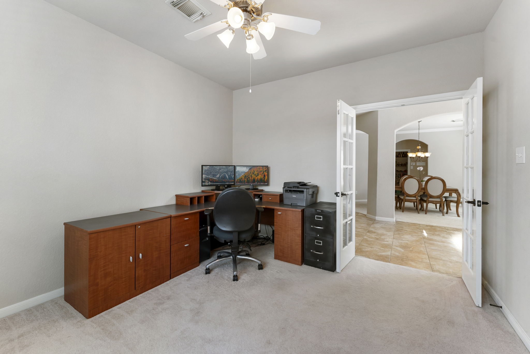 19223 Senterra Lakes Boulevard Spring, TX 77379 - Photo 13 of 48 a view of a workspace with furniture and a livingroom