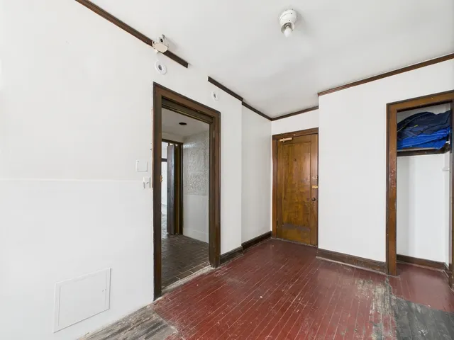 a bathroom with a sink toilet and mirror
