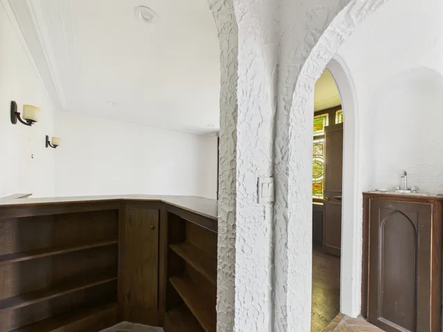 a bathroom with a bathtub and a toilet