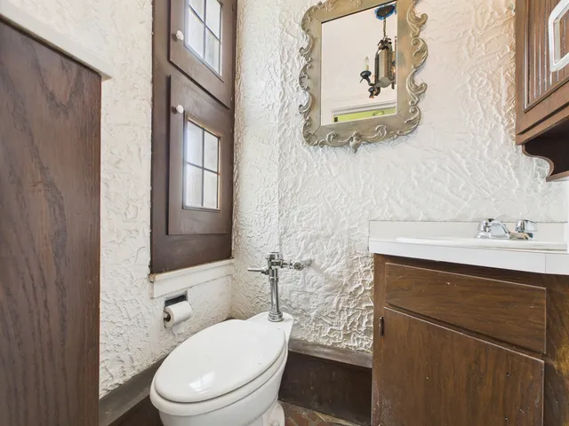 a bathroom with a sink and a large mirror