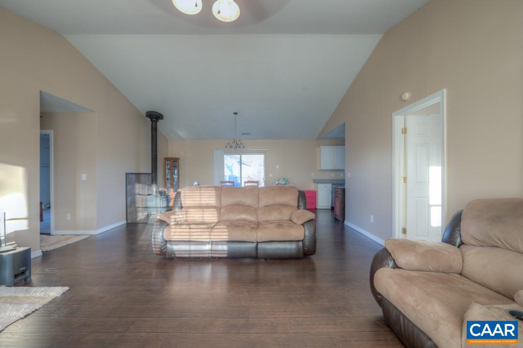11 Buttercup Road Ruckersville, VA 22968 - Photo 5 of 30 a living room with furniture and a large window