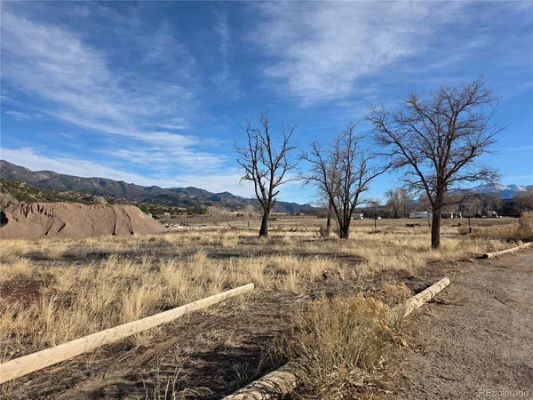 a view of yard covered with snow