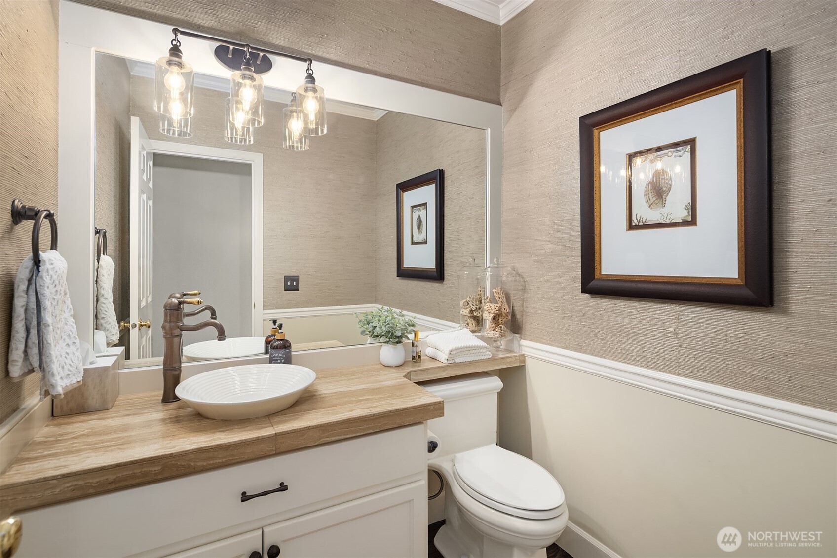 21505 30th Avenue Southeast Bothell, WA 98021 - Photo 16 of 40 a bathroom with a toilet a sink and mirror