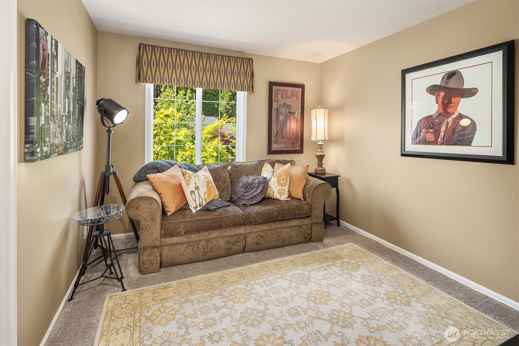 21505 30th Avenue Southeast Bothell, WA 98021 - Photo 25 of 40 a living room with furniture and a large window