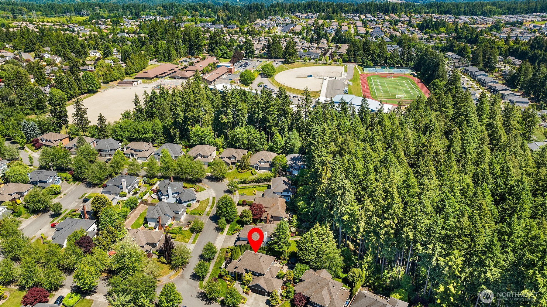 21505 30th Avenue Southeast Bothell, WA 98021 - Photo 33 of 40 a aerial view of a house with a yard and garden