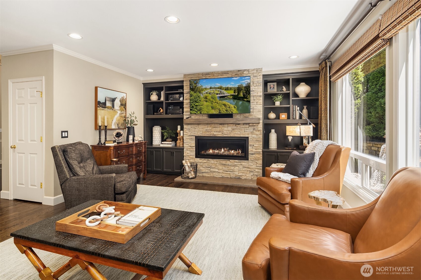 21505 30th Avenue Southeast Bothell, WA 98021 - Photo 10 of 40 a living room with furniture and a fireplace