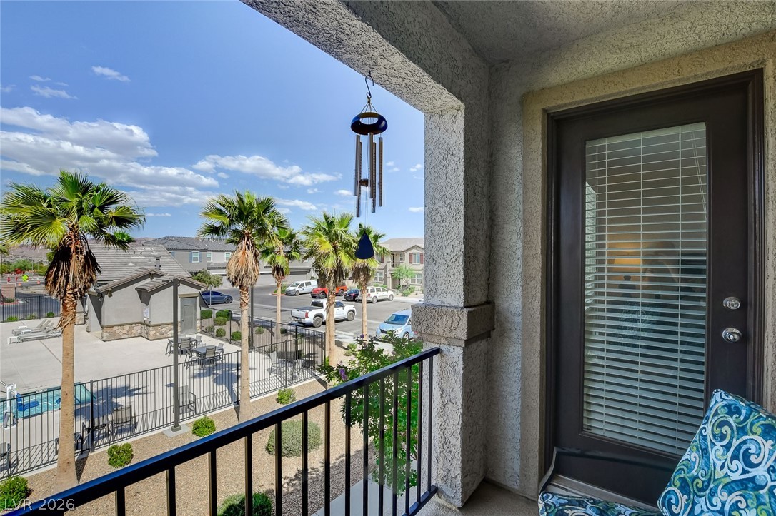 484 Filaree Place Henderson, NV 89015 - Photo 48 of 71 Enjoy tranquil views from this comfortable balcony overlooking the community.
