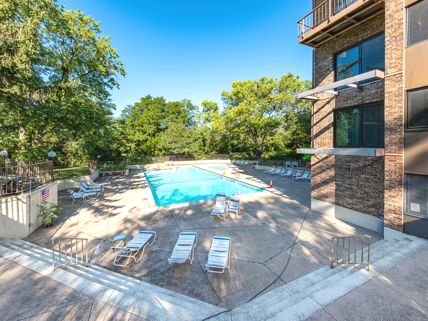425 Walnut Creek Road, Unit 1207 Lisle, IL 60532 - Photo 11 of 11 a view of a backyard with sitting area