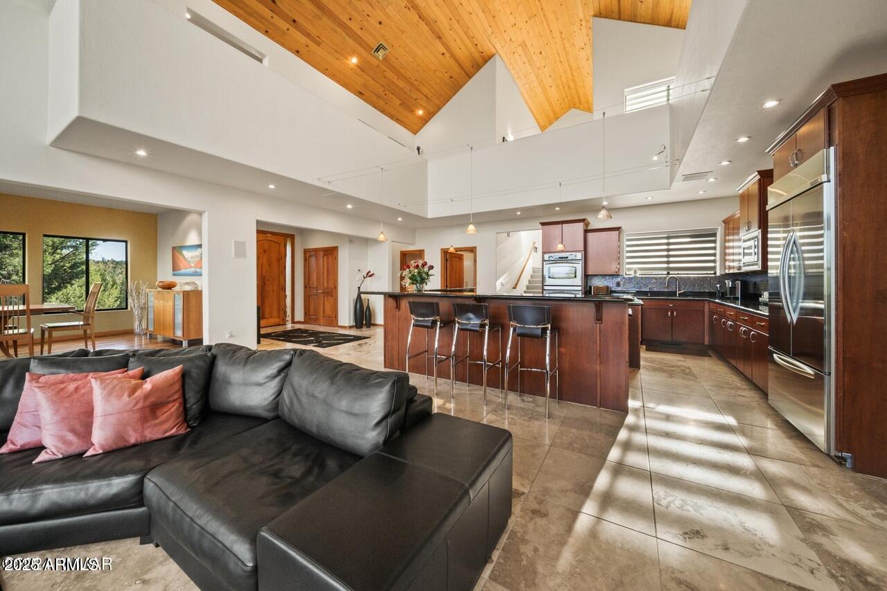 3180 Snowberry Loop Show Low, AZ 85901 - Photo 15 of 101 a living room with furniture and a table