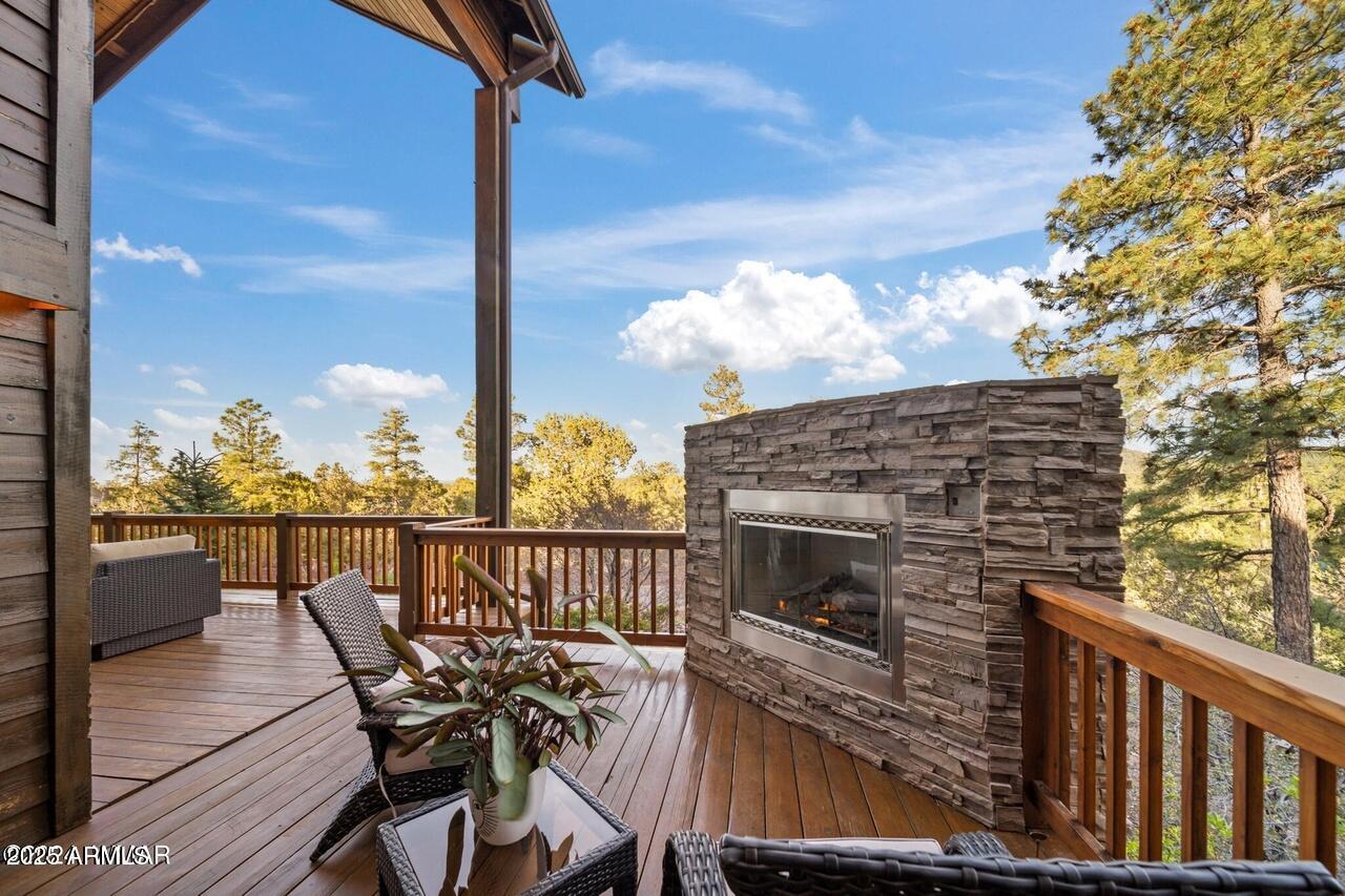 3180 Snowberry Loop Show Low, AZ 85901 - Photo 23 of 101 a view of a balcony with furniture