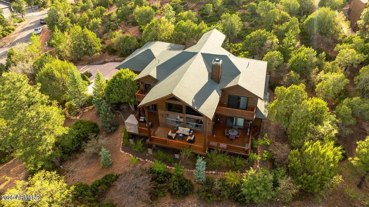 3180 Snowberry Loop Show Low, AZ 85901 - Photo 30 of 101 an aerial view of a house with a yard