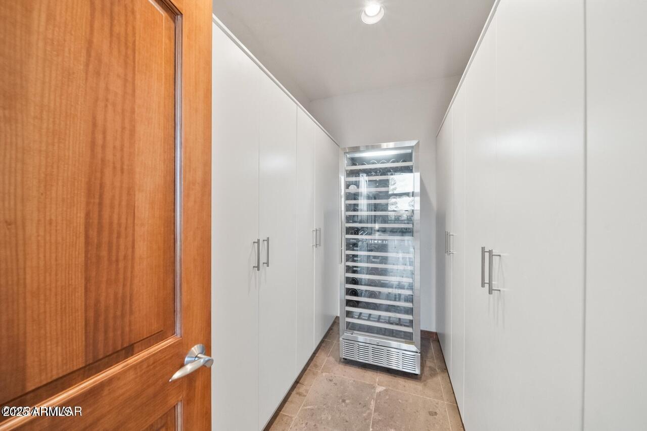 3180 Snowberry Loop Show Low, AZ 85901 - Photo 70 of 101 a view of walk in closet with empty racks