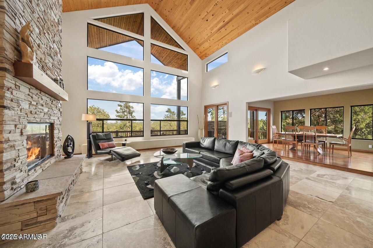 3180 Snowberry Loop Show Low, AZ 85901 - Photo 8 of 101 a living room with furniture large windows and livingroom view