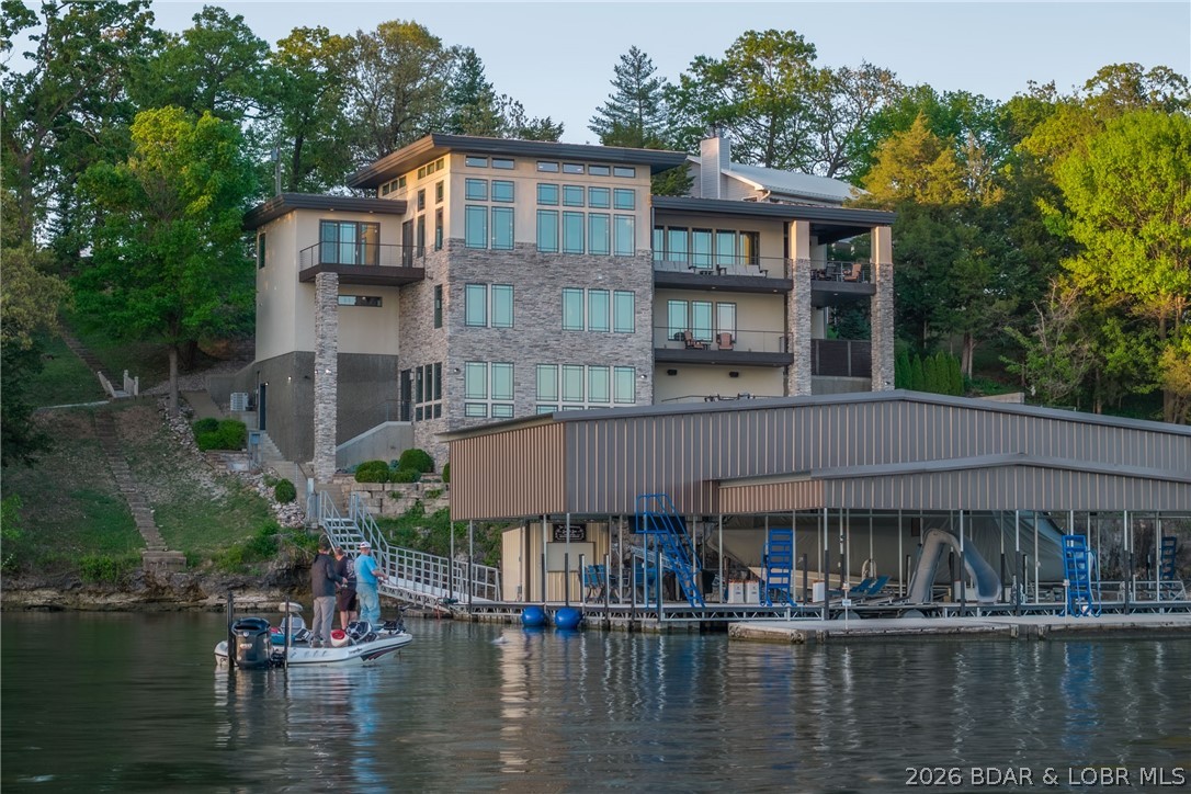 777 Malibu Road Osage Beach, MO 65065 - Photo 4 of 100 No small fish here-just big living, big dock, and