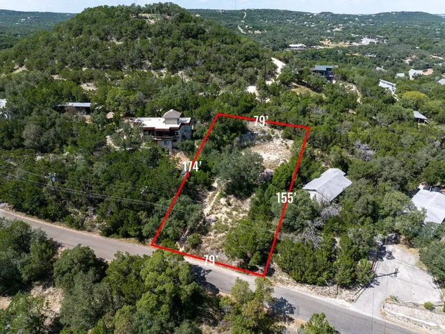 an aerial view of a city with lots of residential buildings