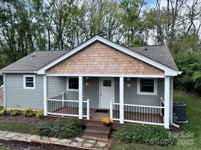 a view of balcony with wooden floor