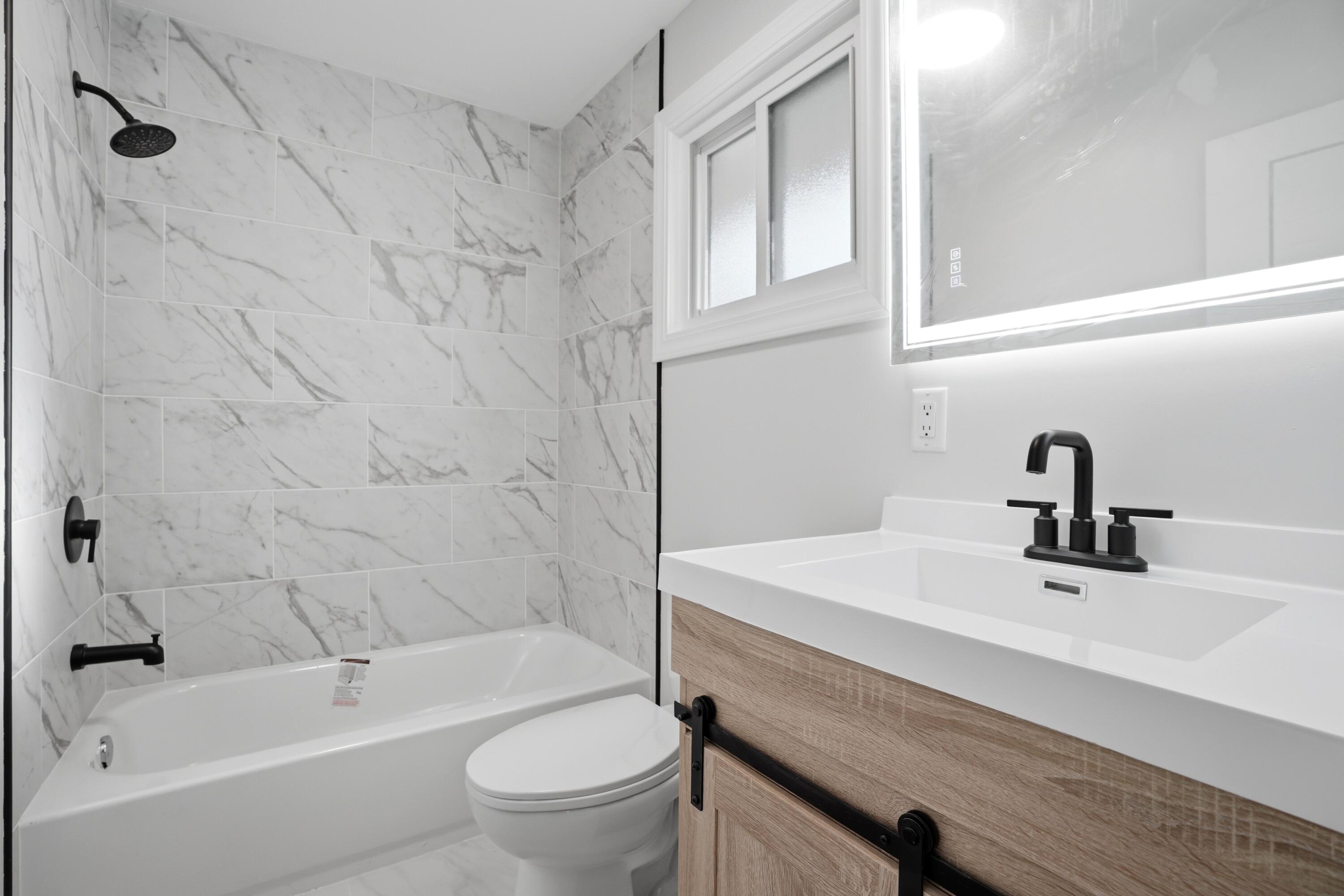 1960 Chase Street Gary, IN 46404 - Photo 12 of 45 a bathroom with a sink toilet and shower