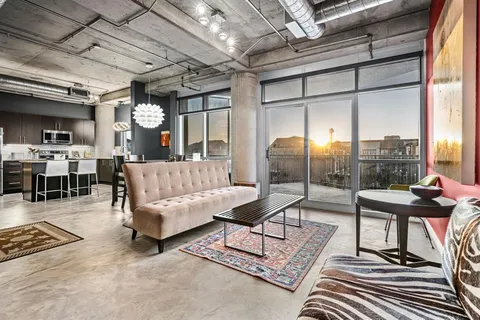 a view of a dining room kitchen and a window