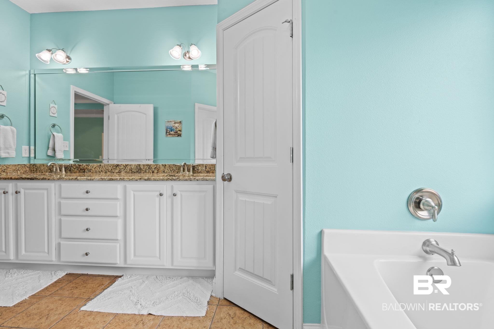 2554 Masters Court Mobile, AL 36618 - Photo 17 of 35 Bathroom featuring double vanity, a bath, and tile patterned flooring