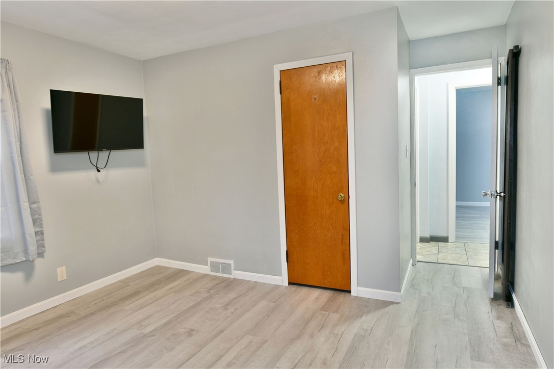 4335 Crew Hood Road Girard, OH 44420 - Photo 30 of 50 Unfurnished bedroom featuring light hardwood / wood-style flooring