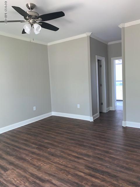 246 Ridge Point Way Macon, GA 31220 - Photo 6 of 8 a view of an empty room with wooden floor